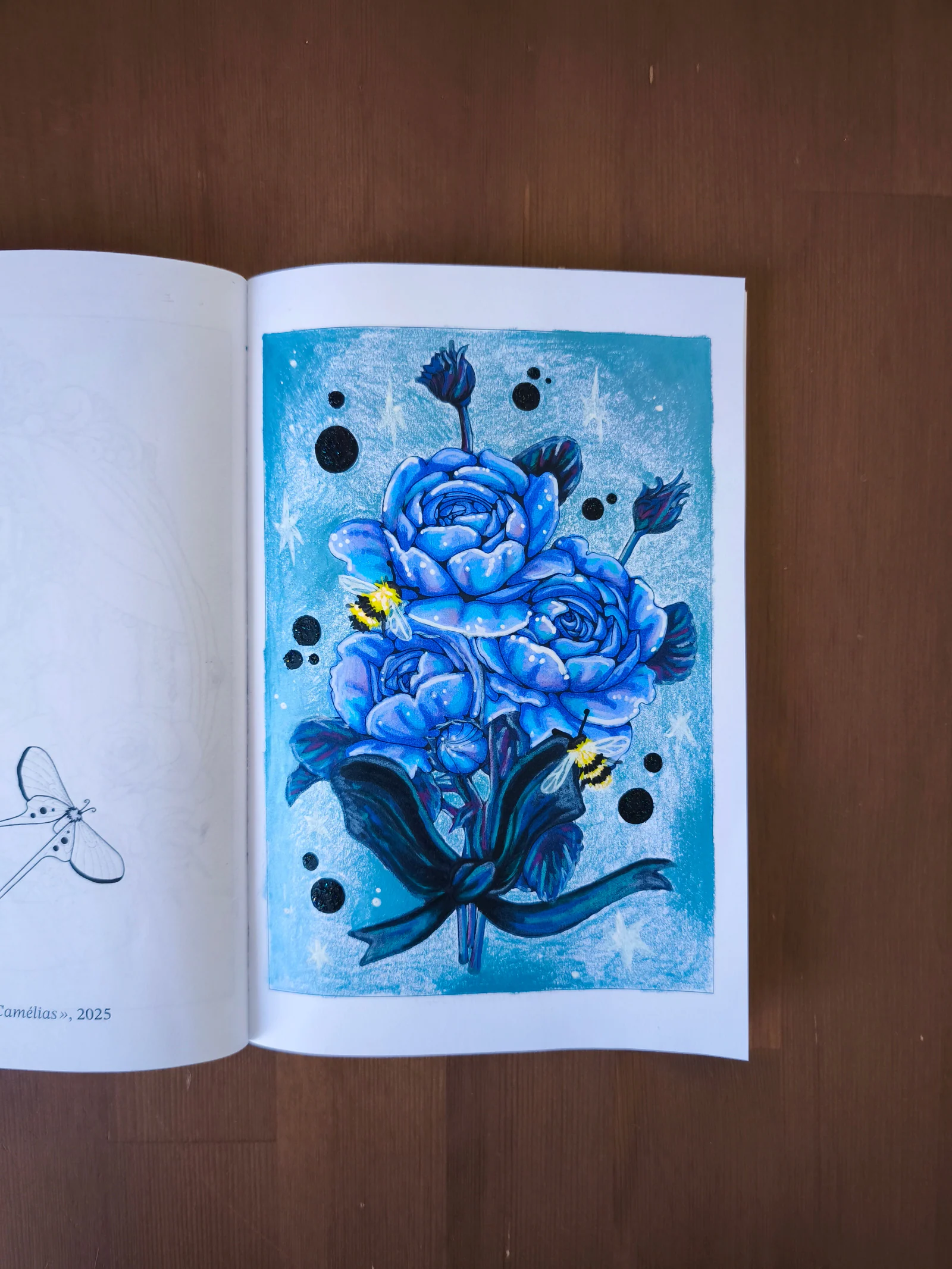 Le livre Lullaby ouvert sur une illustration bleue